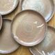 Lot de 8 assiettes plates en grès émaillé vintage