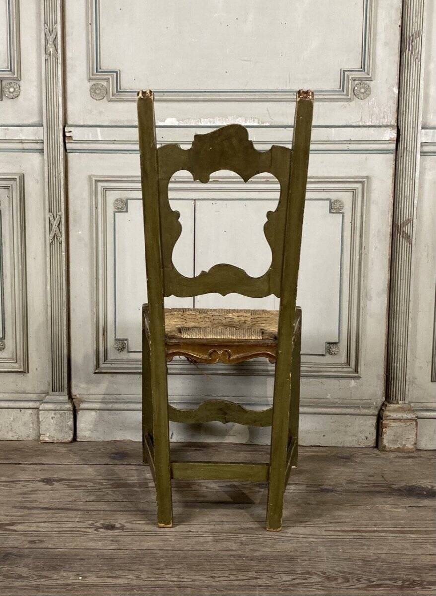 Set of 12 carved wooden chairs, Italy