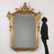 Antique umbertine mirror in Swiss pine, Italy, 19th century.