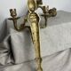 Pair of wall candle holders in bronze