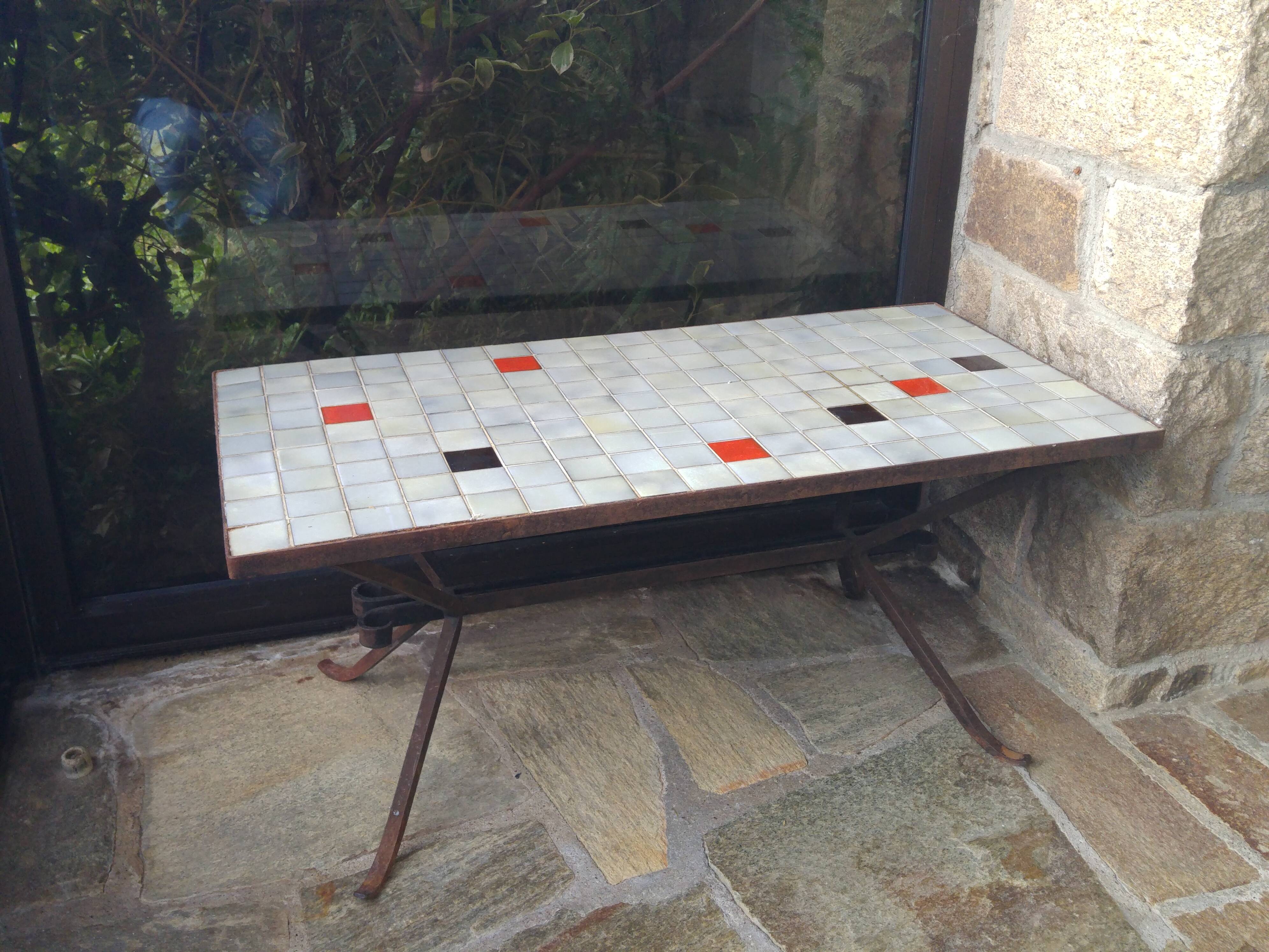 Coffee table, ceramic top, wrought iron foot