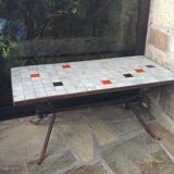 Coffee table, ceramic top, wrought iron foot