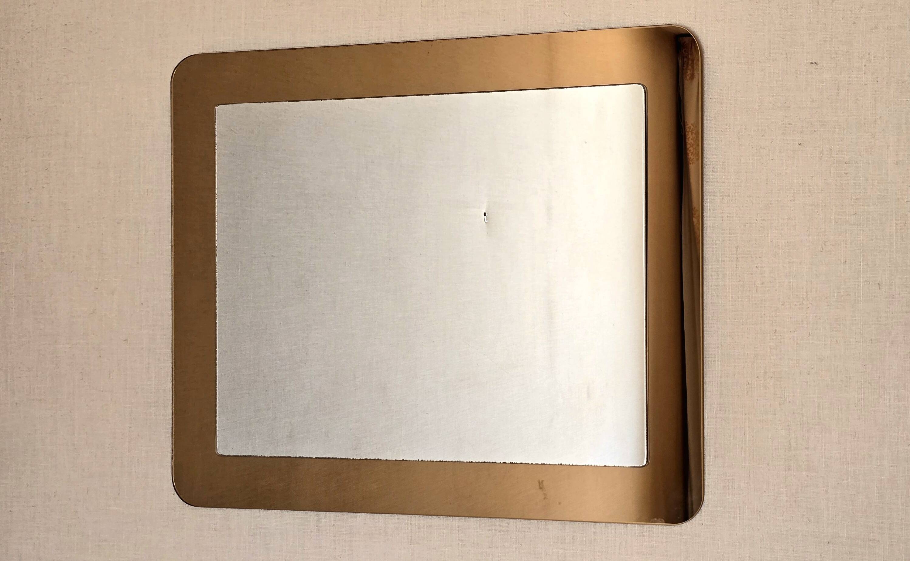 Italian mirror in bronze mirror glass, circa 1970 – attributed to Fontana Arte.