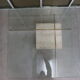 70s travertine and brass coffee table