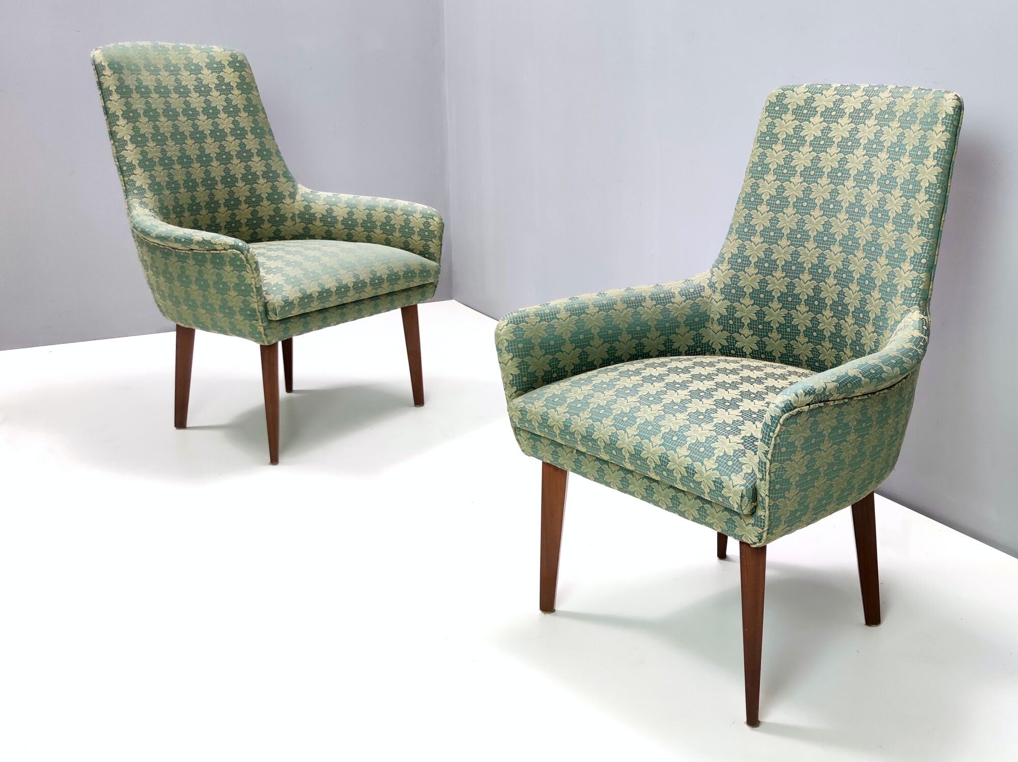 Green fabric and beech armchairs, italy