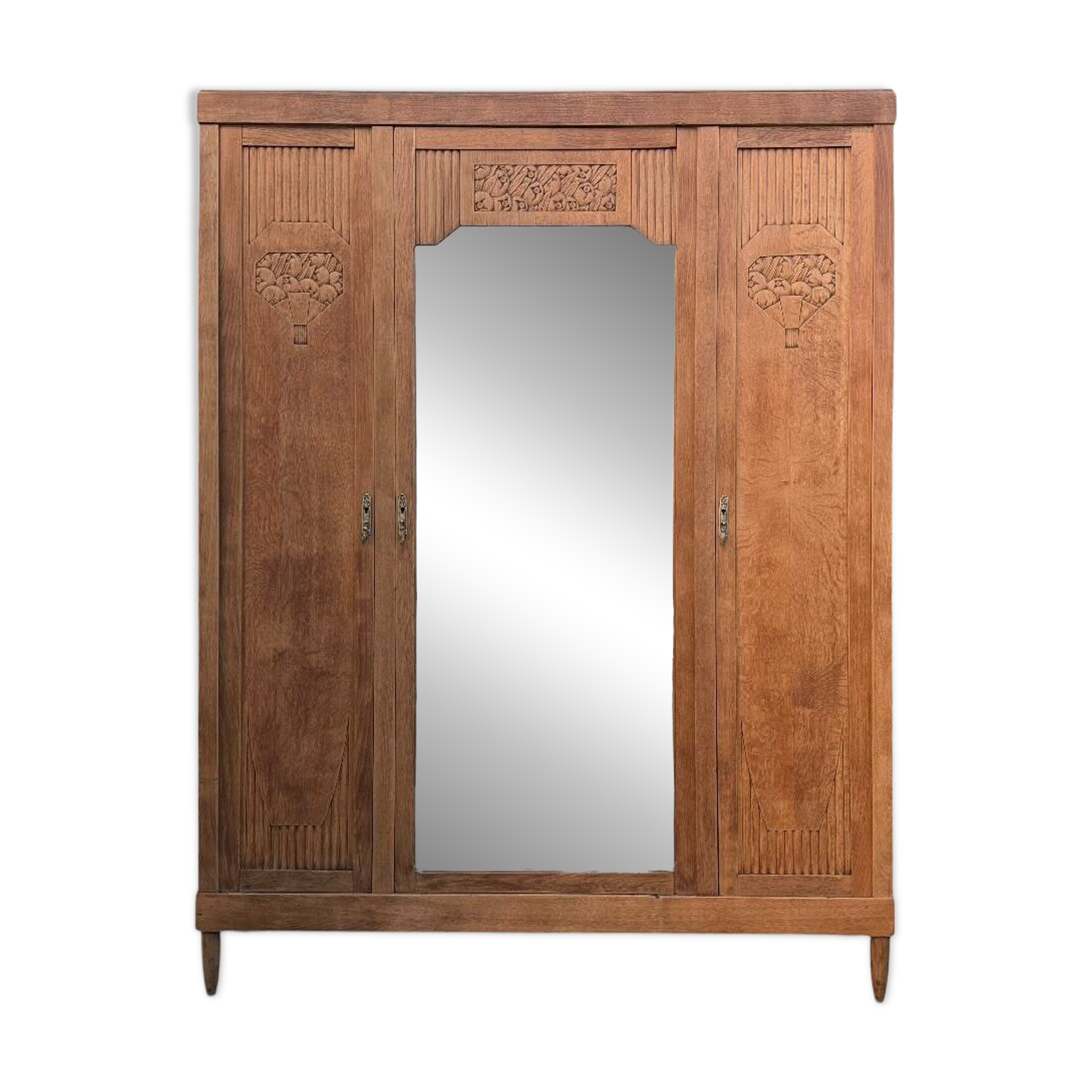 Art deco wardrobe in raw oak with bevelled mirror.