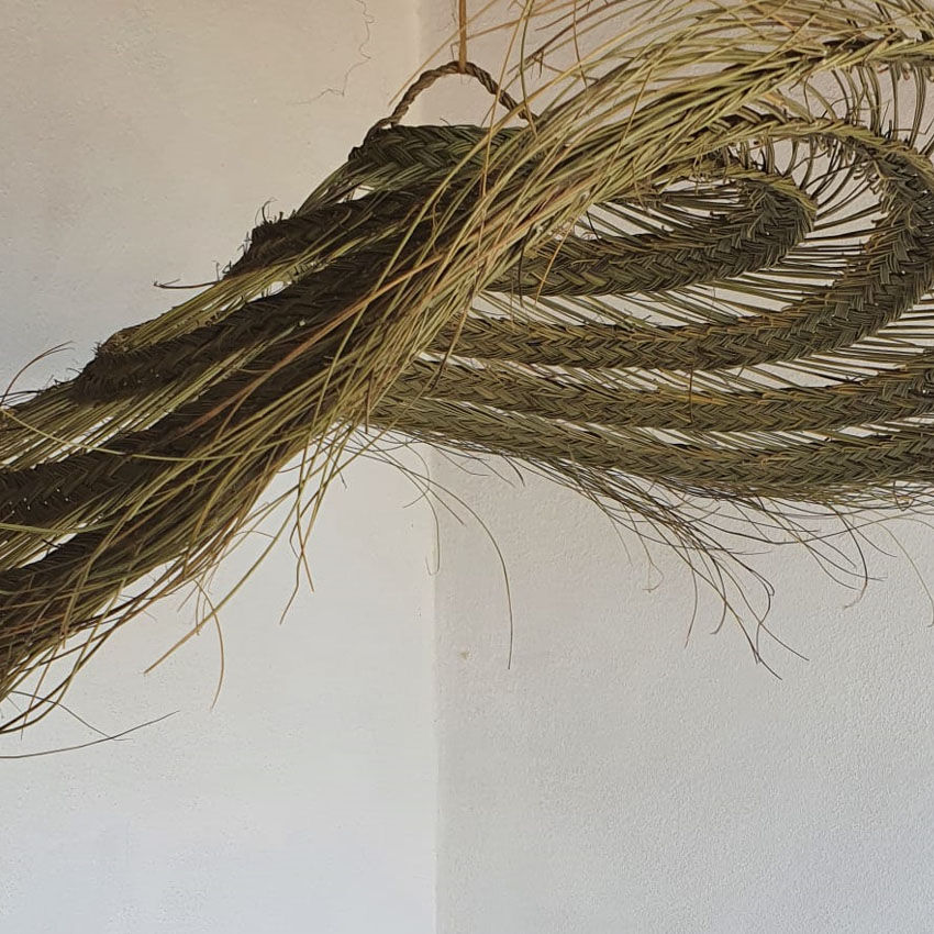 Doum pendant light in natural esparto