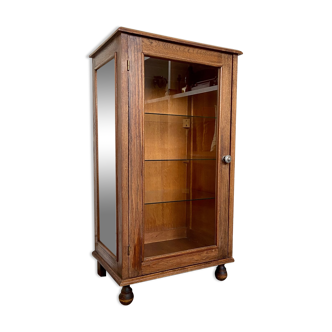 Dark wood display case and transparent glass