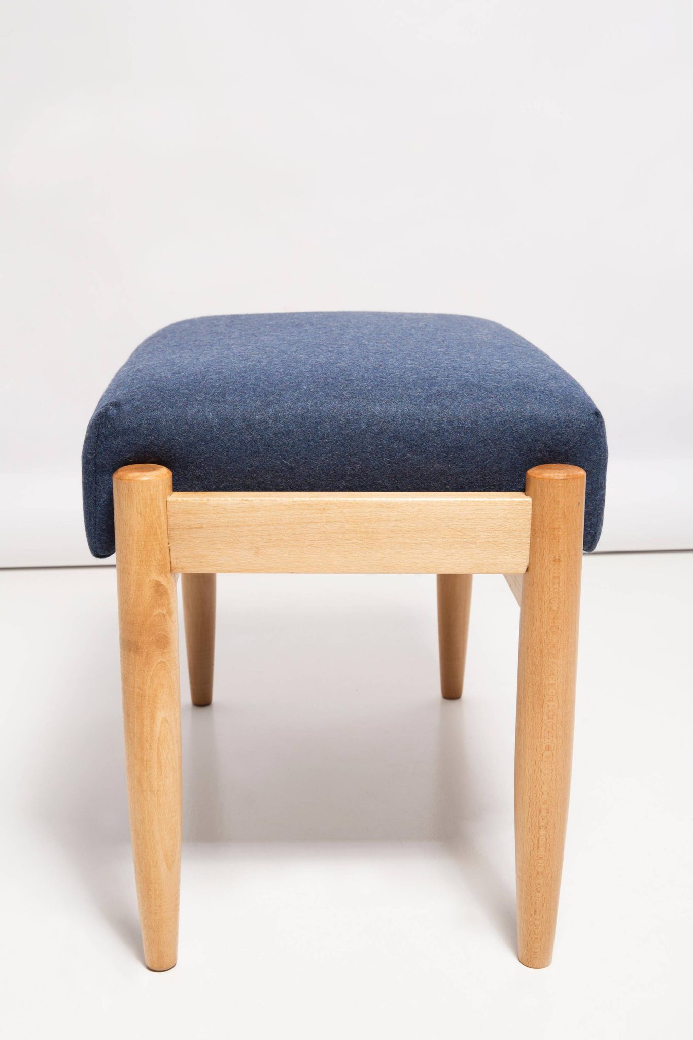 Pair of vintage navy blue wool stools from the mid-20th century, Edmund Homa, 1960s.