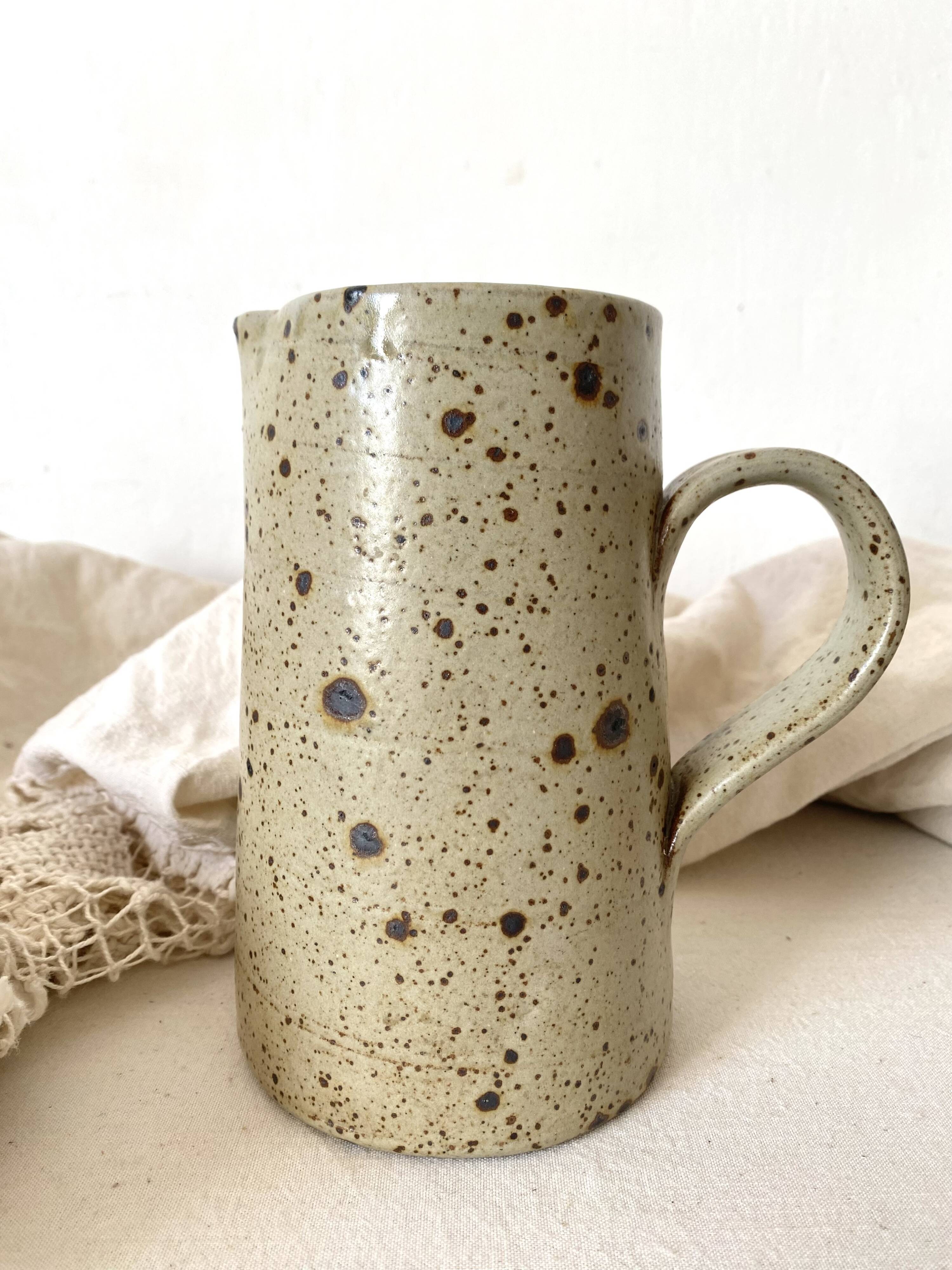 Pyreted stoneware pitcher