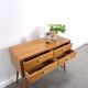 Vintage teak Danish chest of drawers with high slanted legs, side table, sideboard.