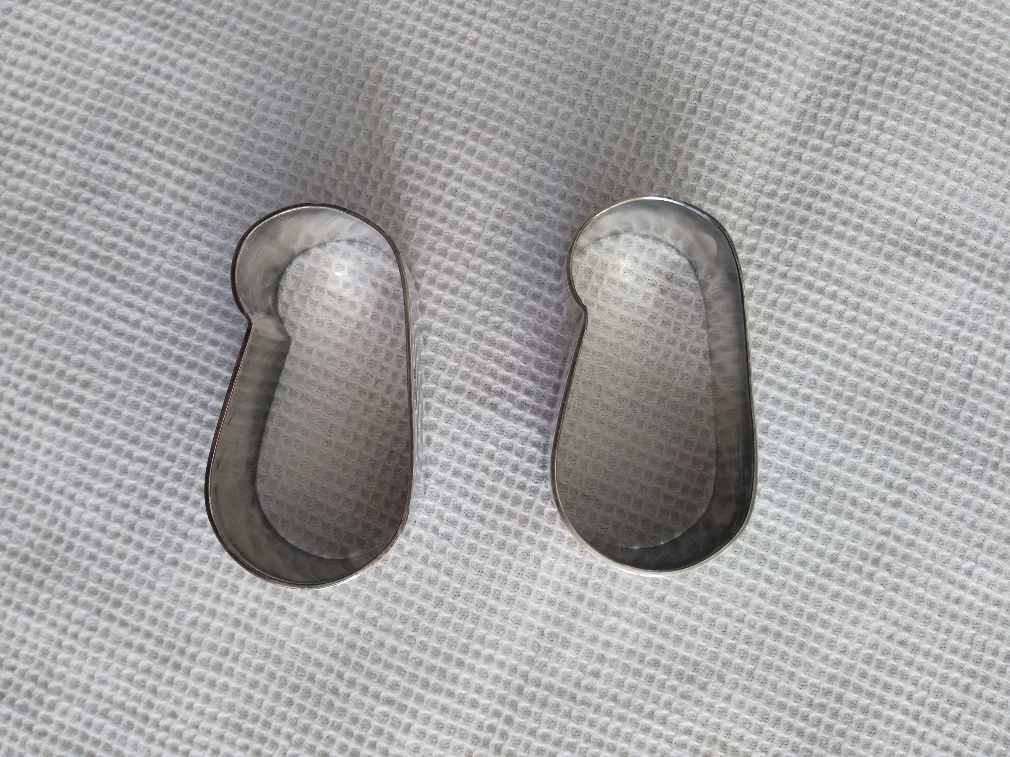 Duo of silver metal towel rings Art Deco style