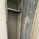 Patinated metal industrial-style locker cabinet