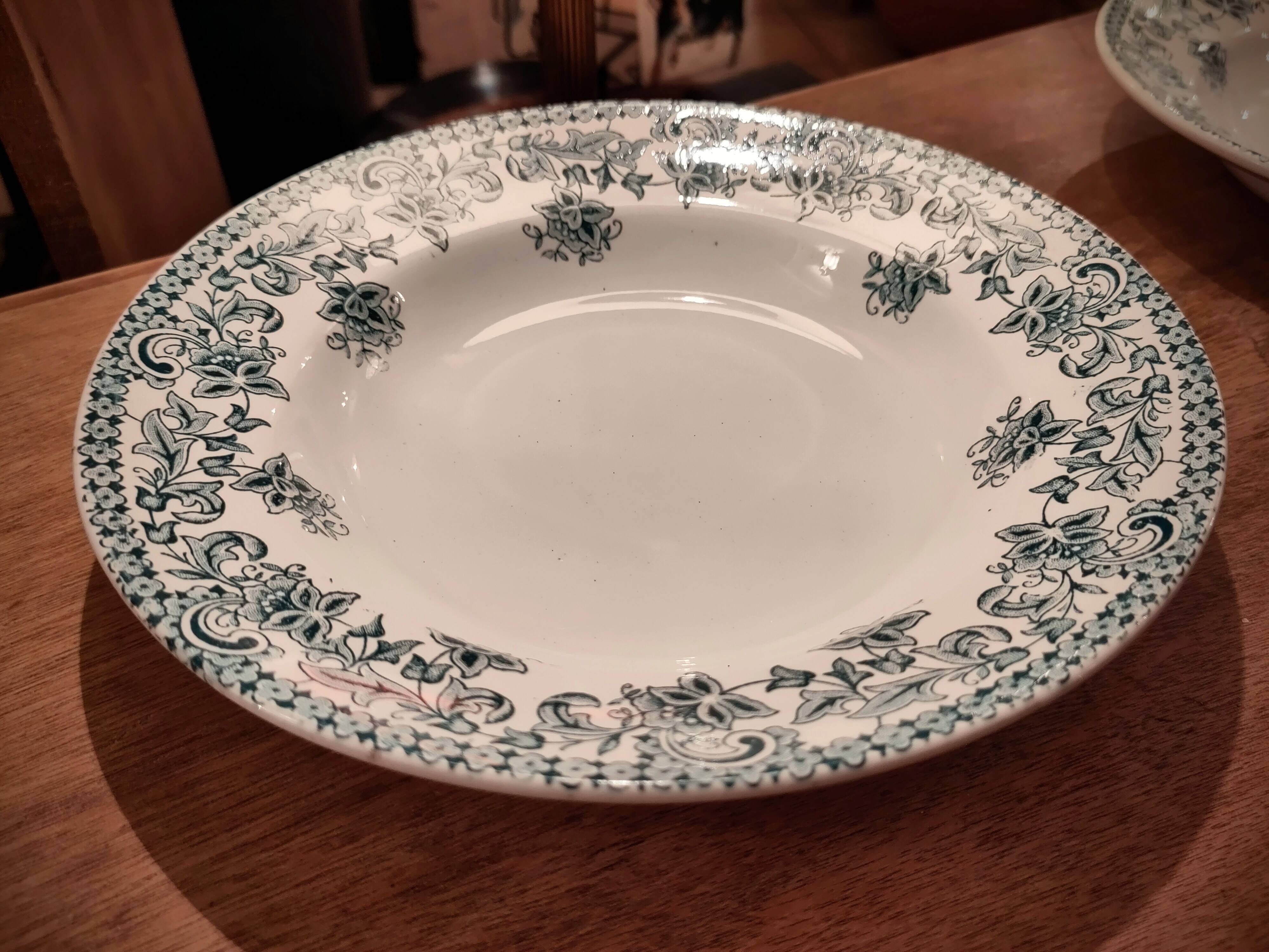 Four Saint Amand plates