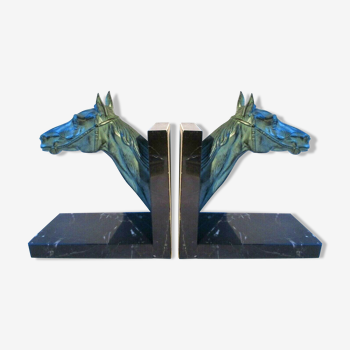 Art deco bookend metal horse heads on black marble