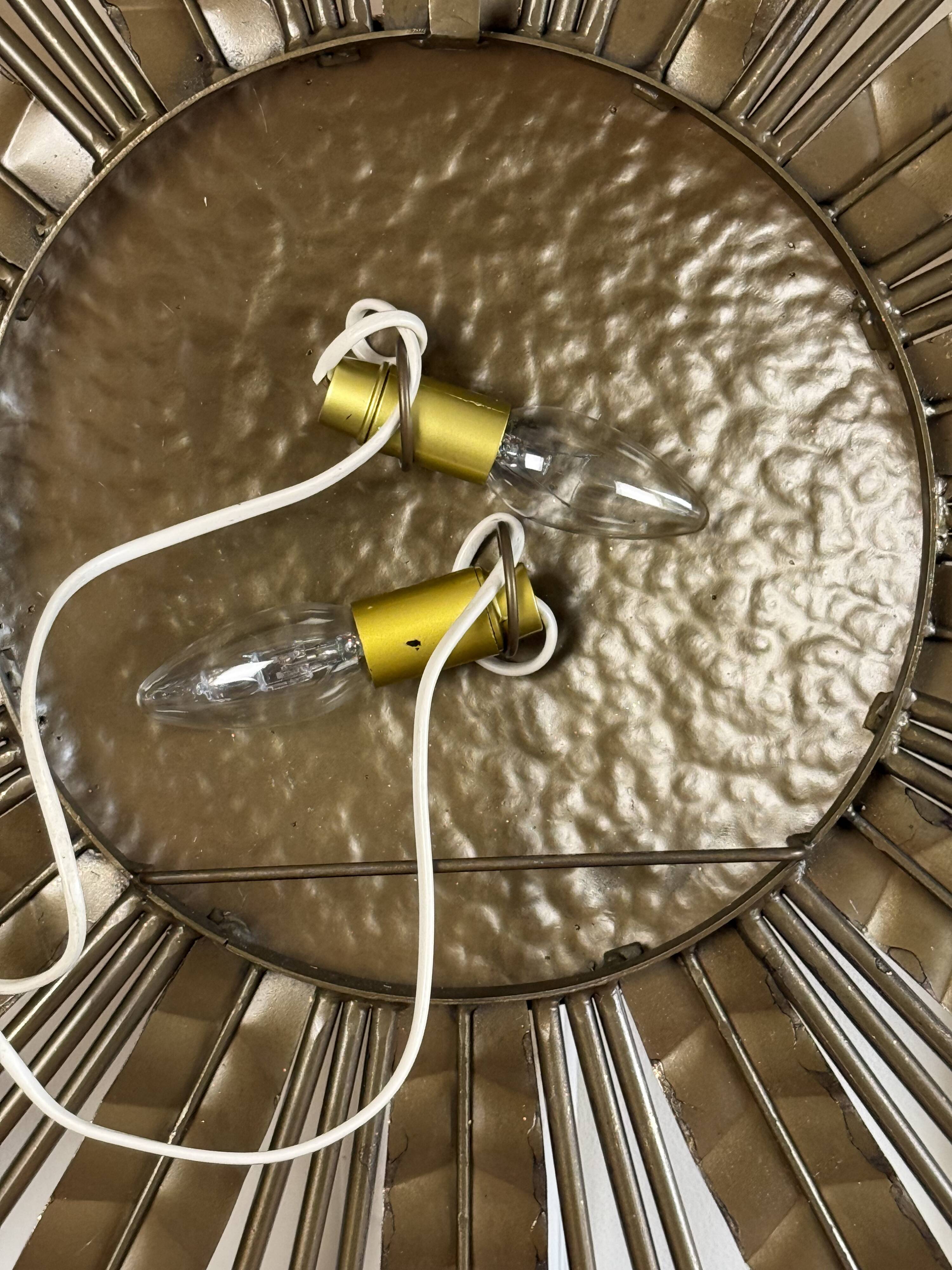 Large golden hammered metal sun wall light with a diameter of 90 cm from the year