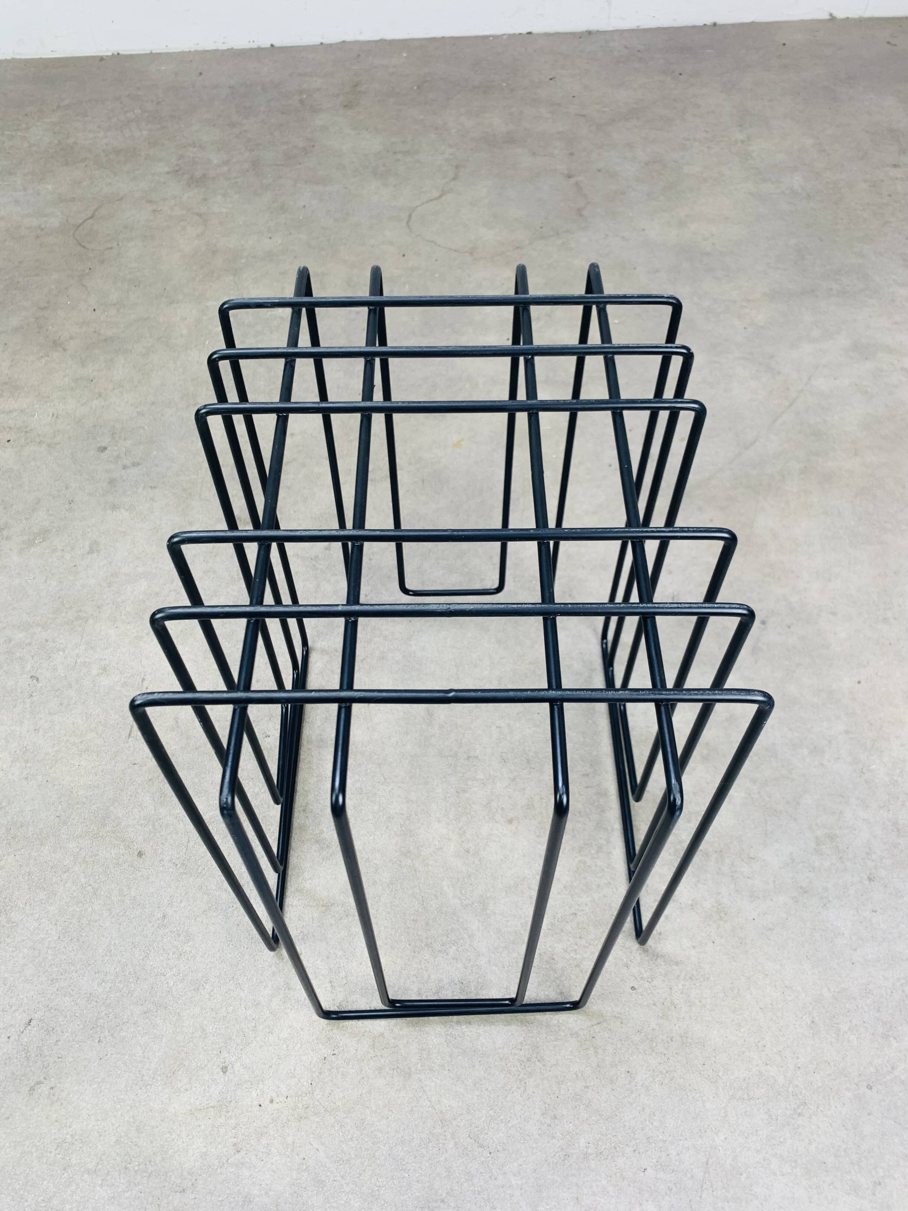 Black metal magazine rack by Willy Glaeser for TMP, 1980s.