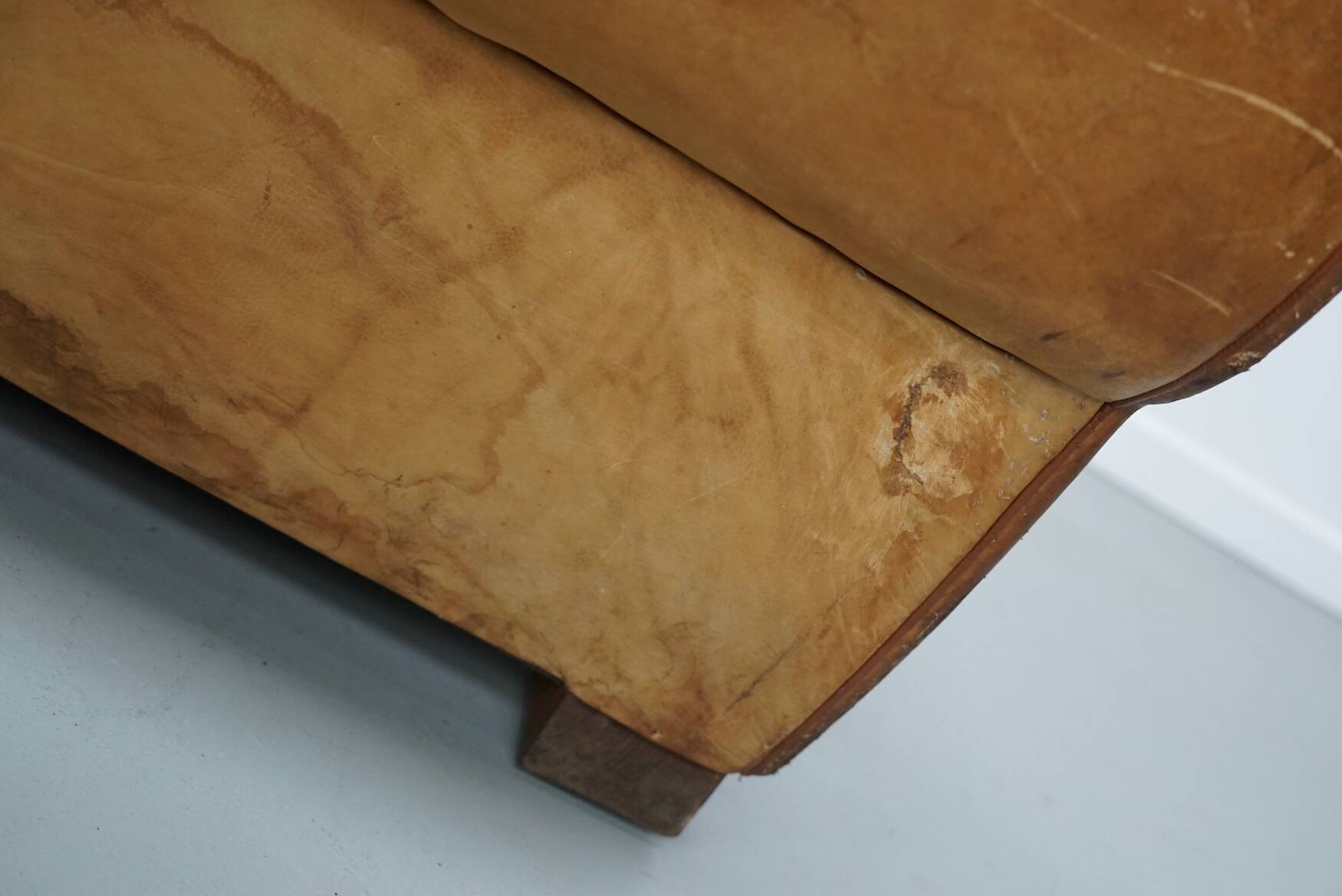 Pair of French club chairs with moustache back in cognac leather, 1940s