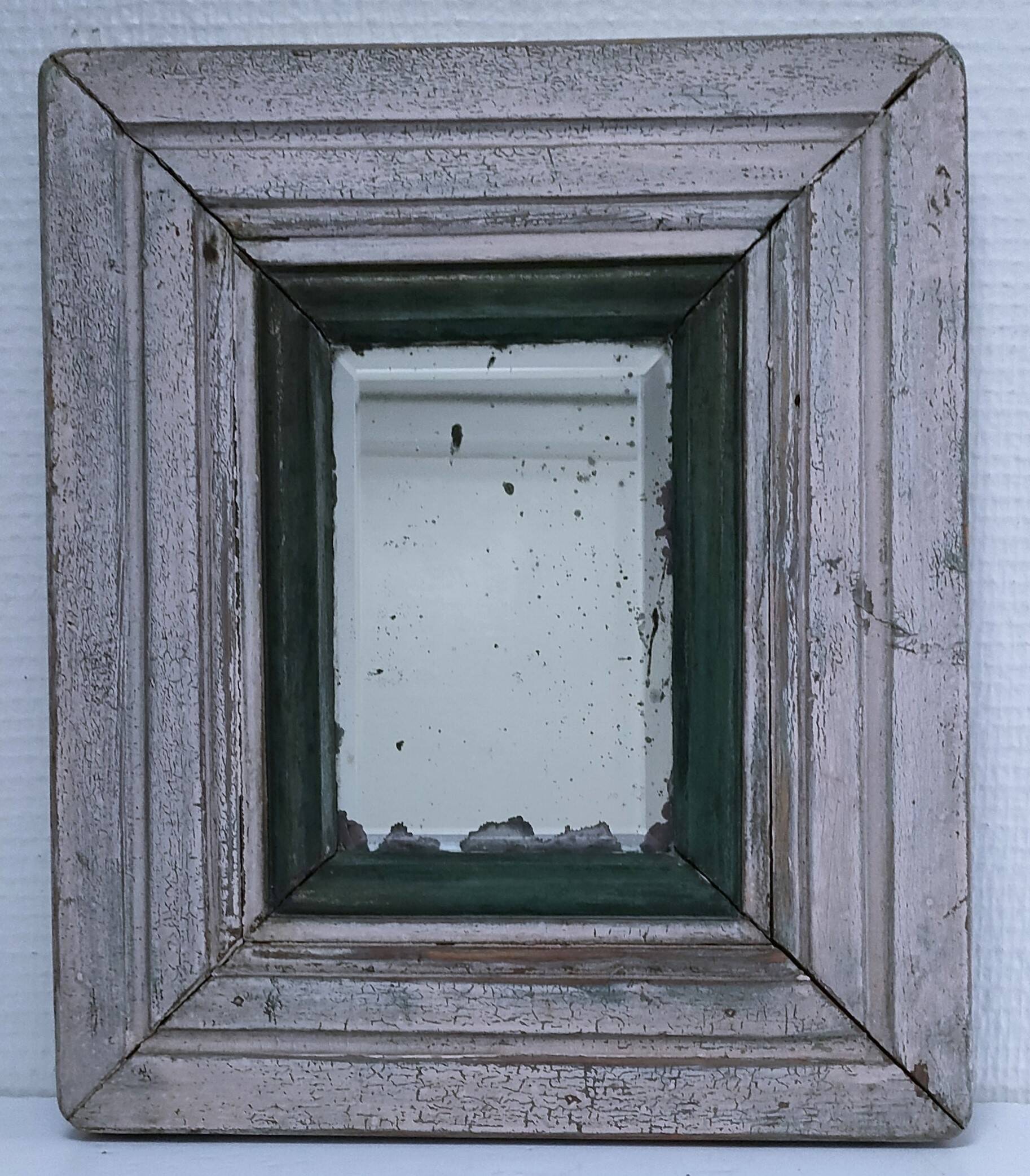 Beveled mirror patinated wood early 20th century