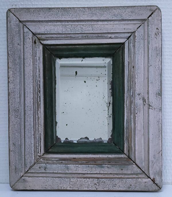 Miroir biseauté bois patiné début xxème