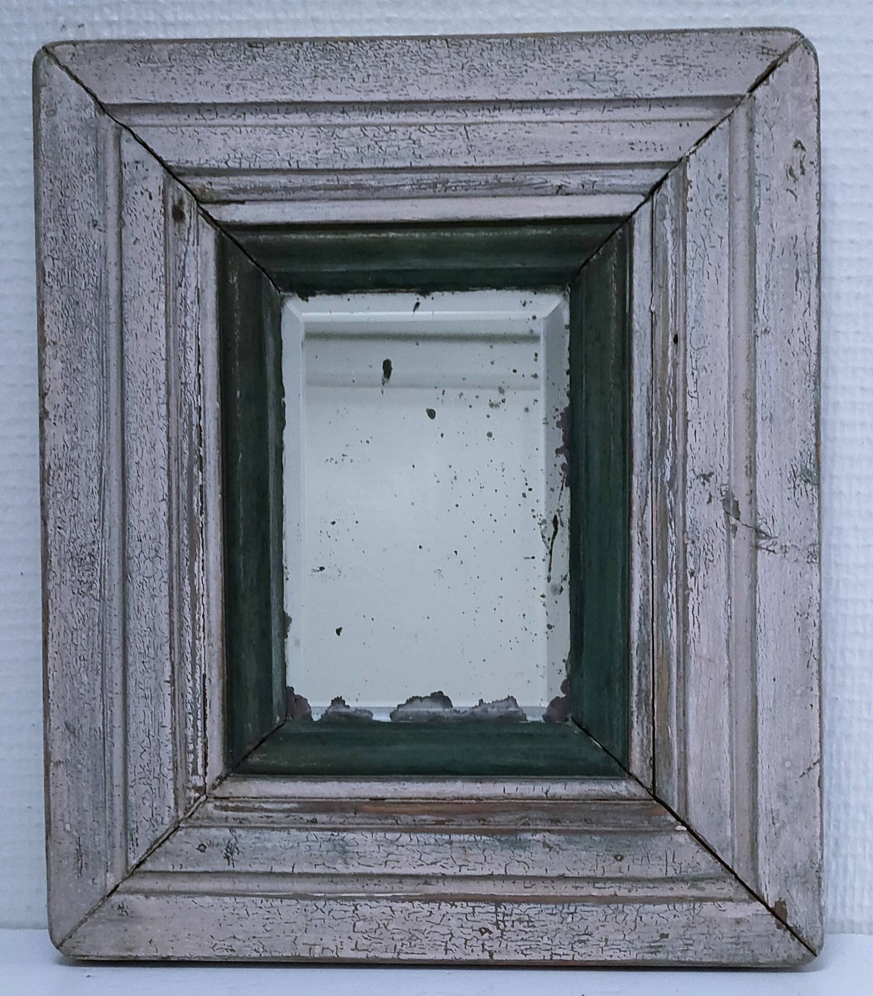 Miroir biseauté bois patiné début xxème