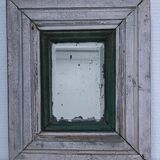 Beveled mirror patinated wood early 20th century