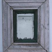 Miroir biseauté bois patiné début xxème