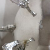 Silver sugar bowl with paw feet and ornate handles