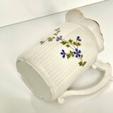 Pot à lait au décor de barbeaux