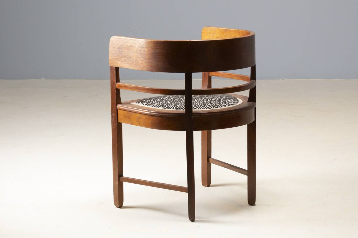 Central European armchair from the early 20th century with an inlaid backrest.