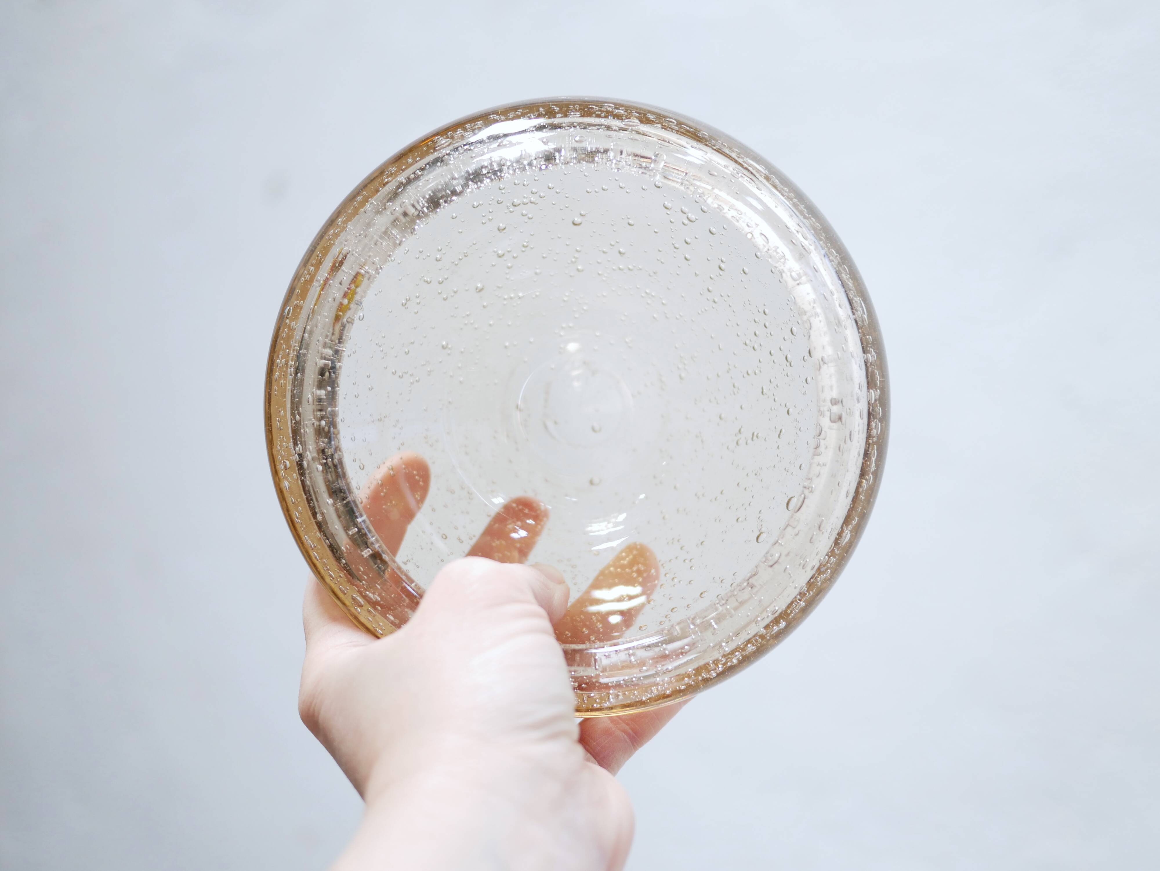 Empty vintage glass pocket blown by the glassworks of Biot