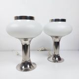 Pair of vintage futuristic style table lamps in chrome and opal glass.