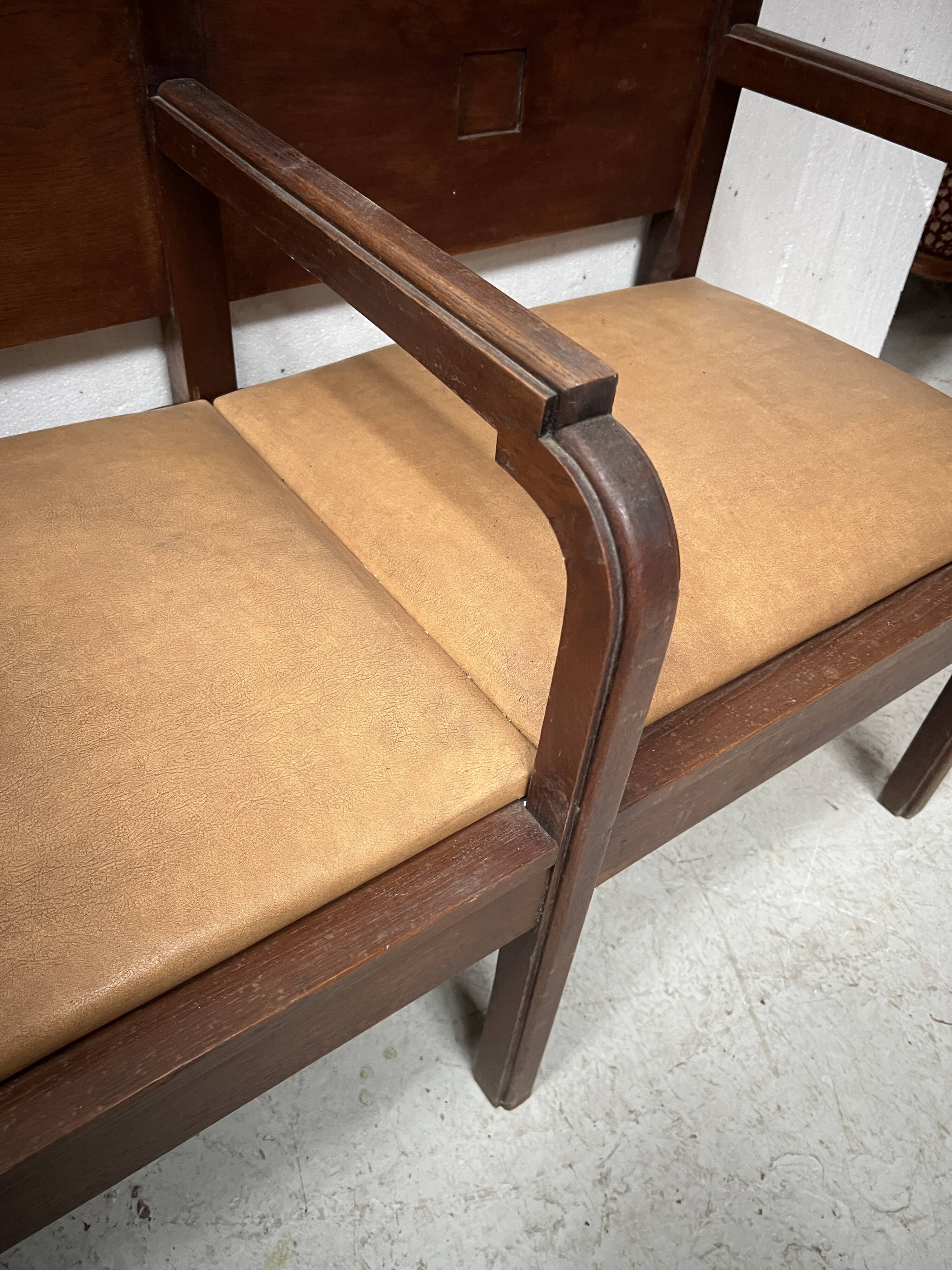 Art Deco two-seater bench in solid mahogany, 20th century.