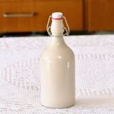 Bouteille à bière ancienne en grès émaillé signée MKM