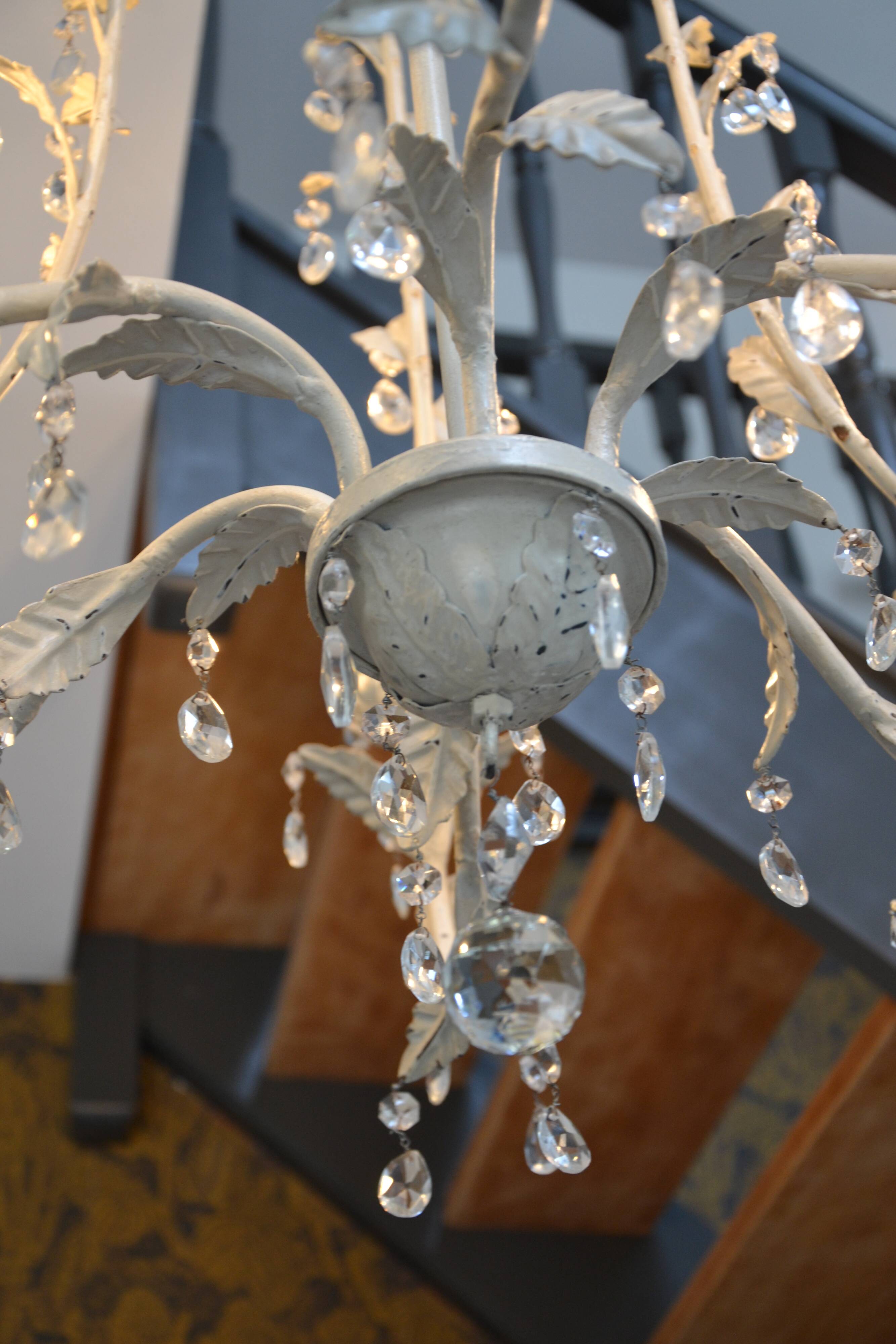 Large cage chandelier in aged metal.