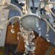 Large cage chandelier in aged metal.