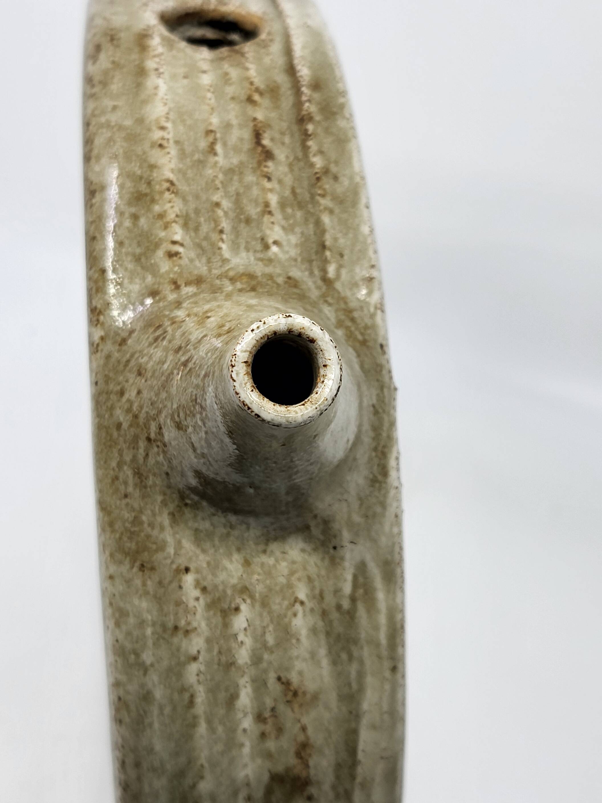 Vintage glazed stoneware pitcher in sculptural ring shape (1970s)