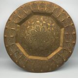 Oriental brass tray with chiseled decoration of arabesques and flowers