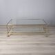 Vintage 1970s gold-plated metal and glass coffee table, designed by Allegri