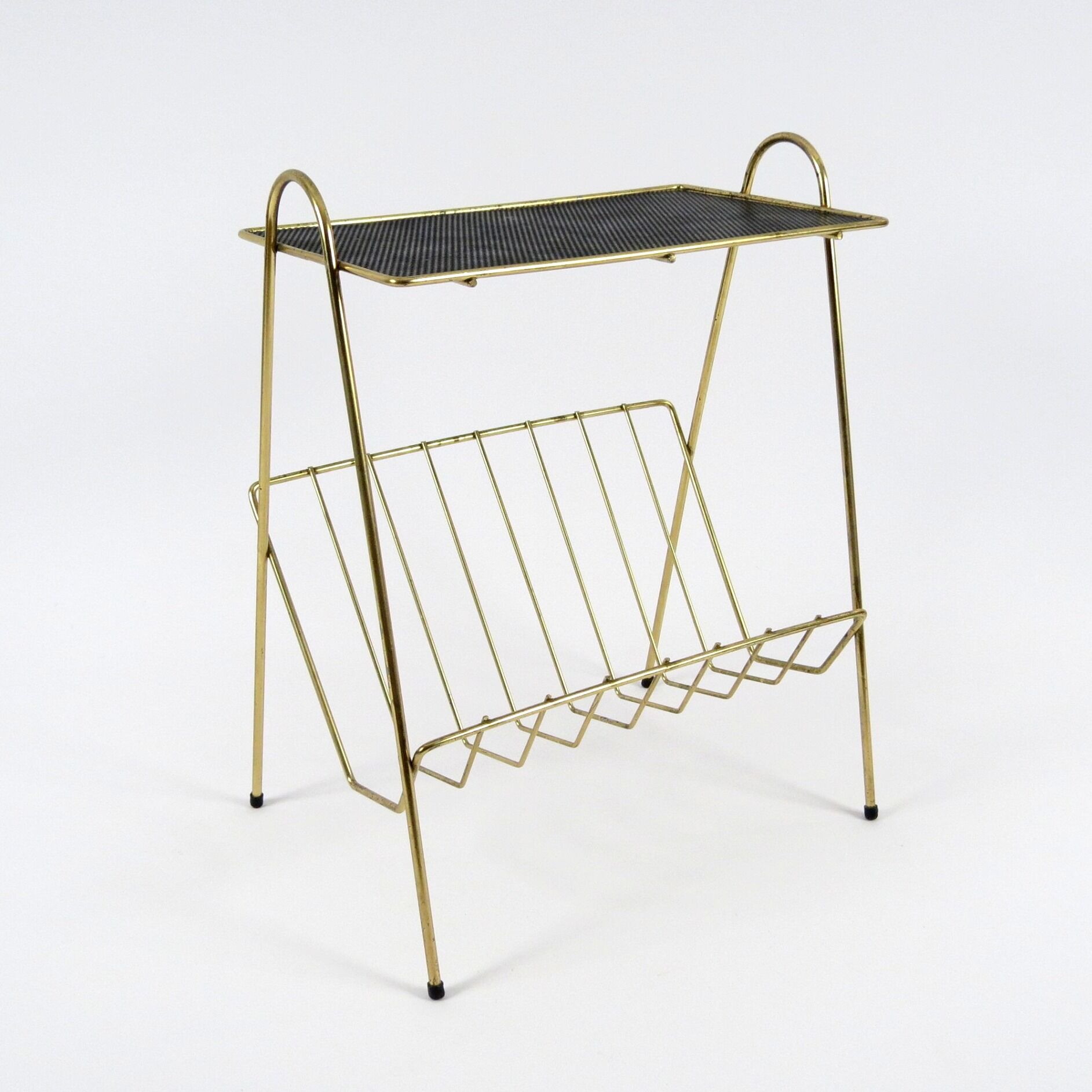 Brass magazine rack 1950s