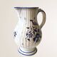 Moutiers earthenware jug, hand-painted blue decoration.