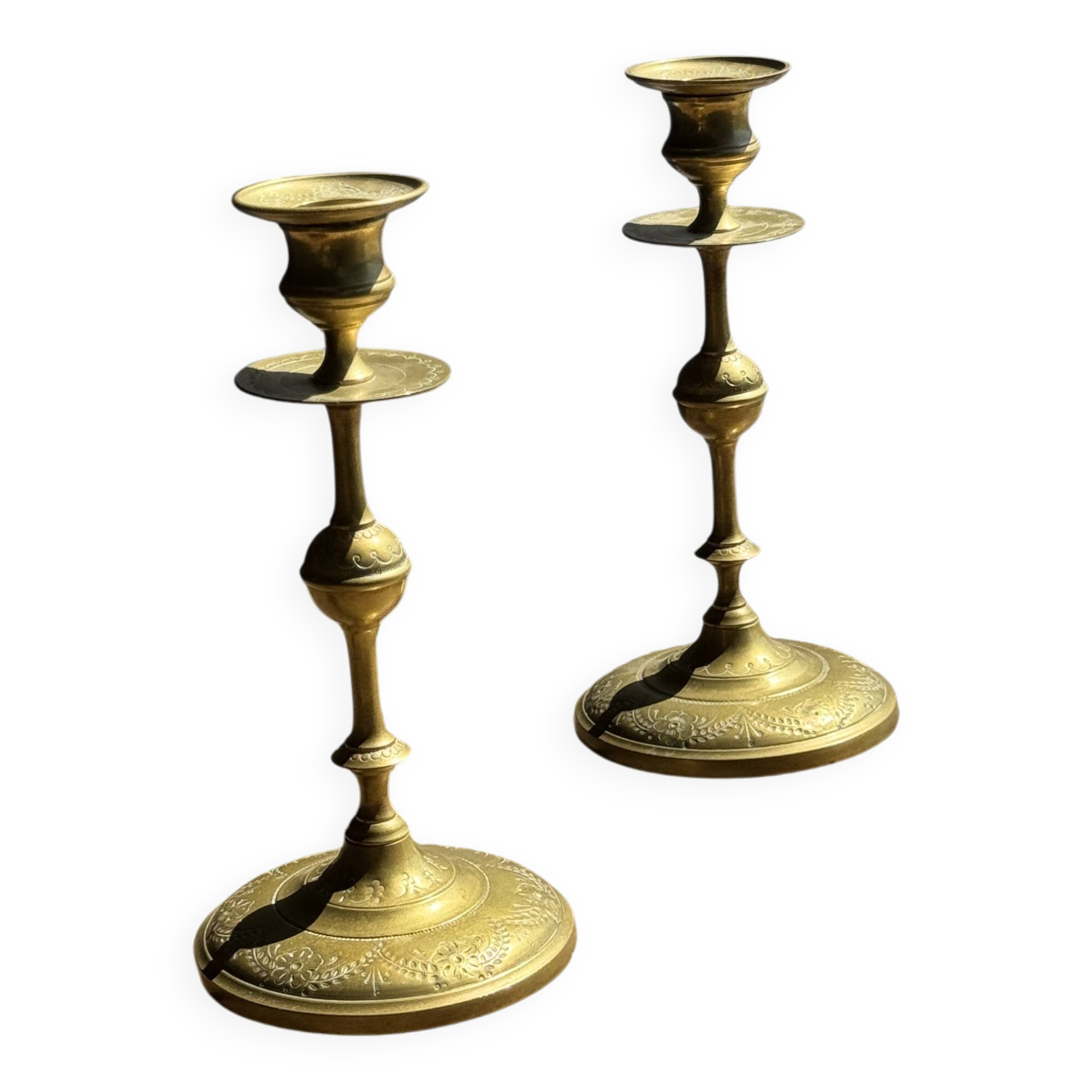 Pair of gilded candlesticks with engraved flower garland motifs H22