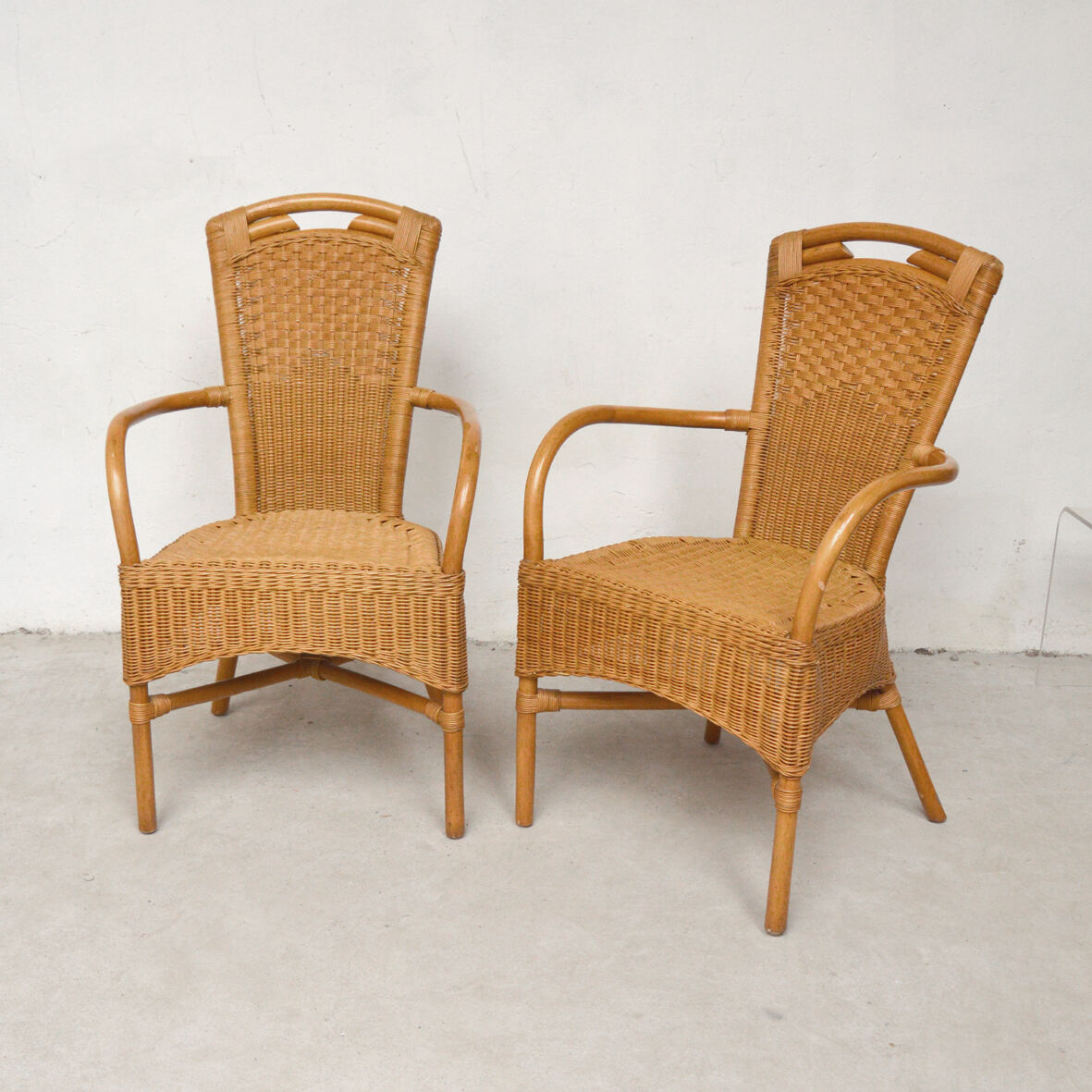 Pair of rattan armchairs