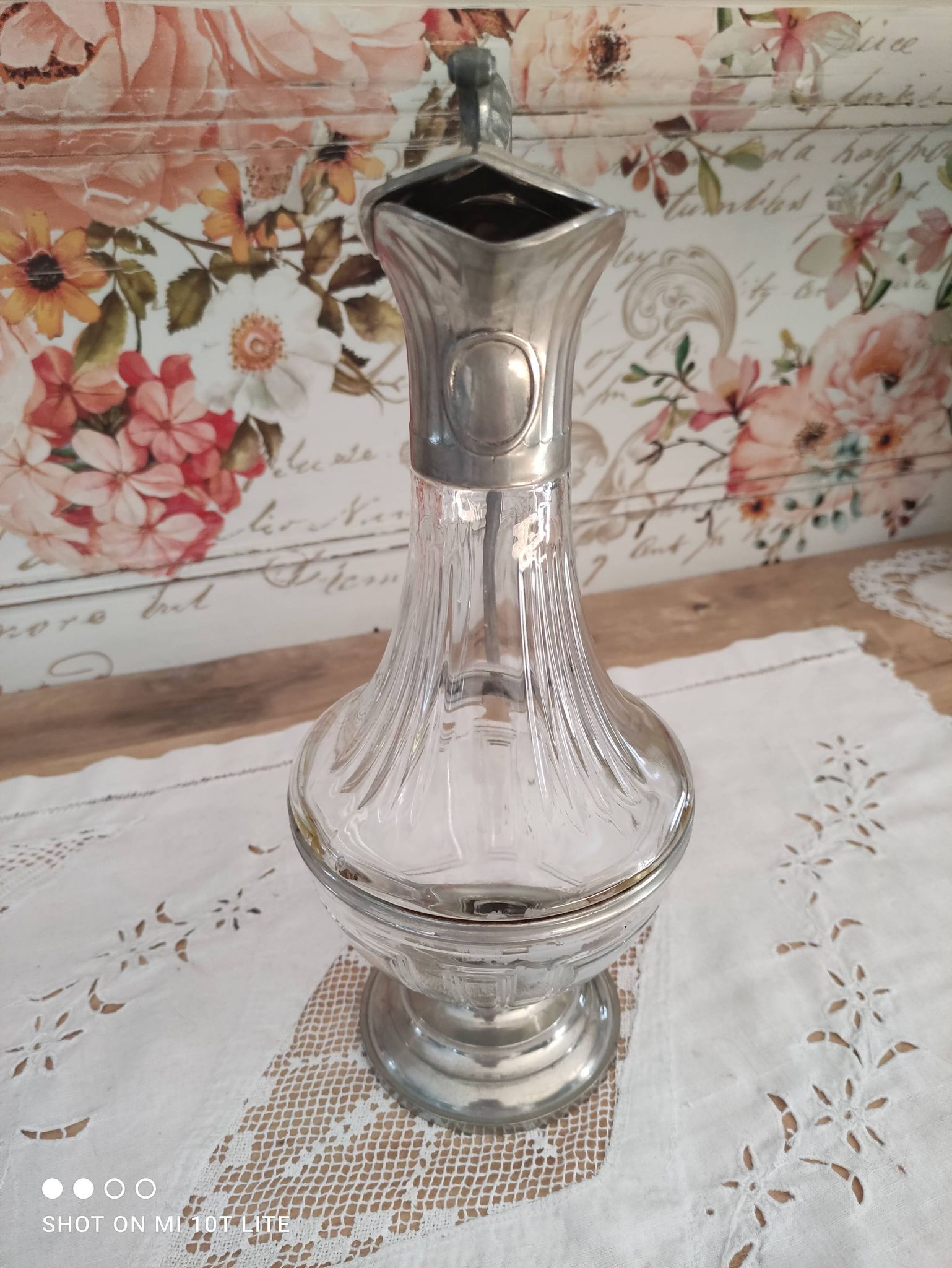 Old water decanter in curved glass and tin Art Nouveau style