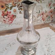 Old water decanter in curved glass and tin Art Nouveau style