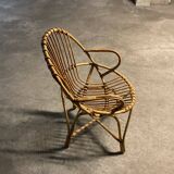 Wicker and rattan shell chair from the 1960s/70s, in very good condition.