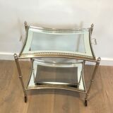Neoclassical style rolling table in silver metal