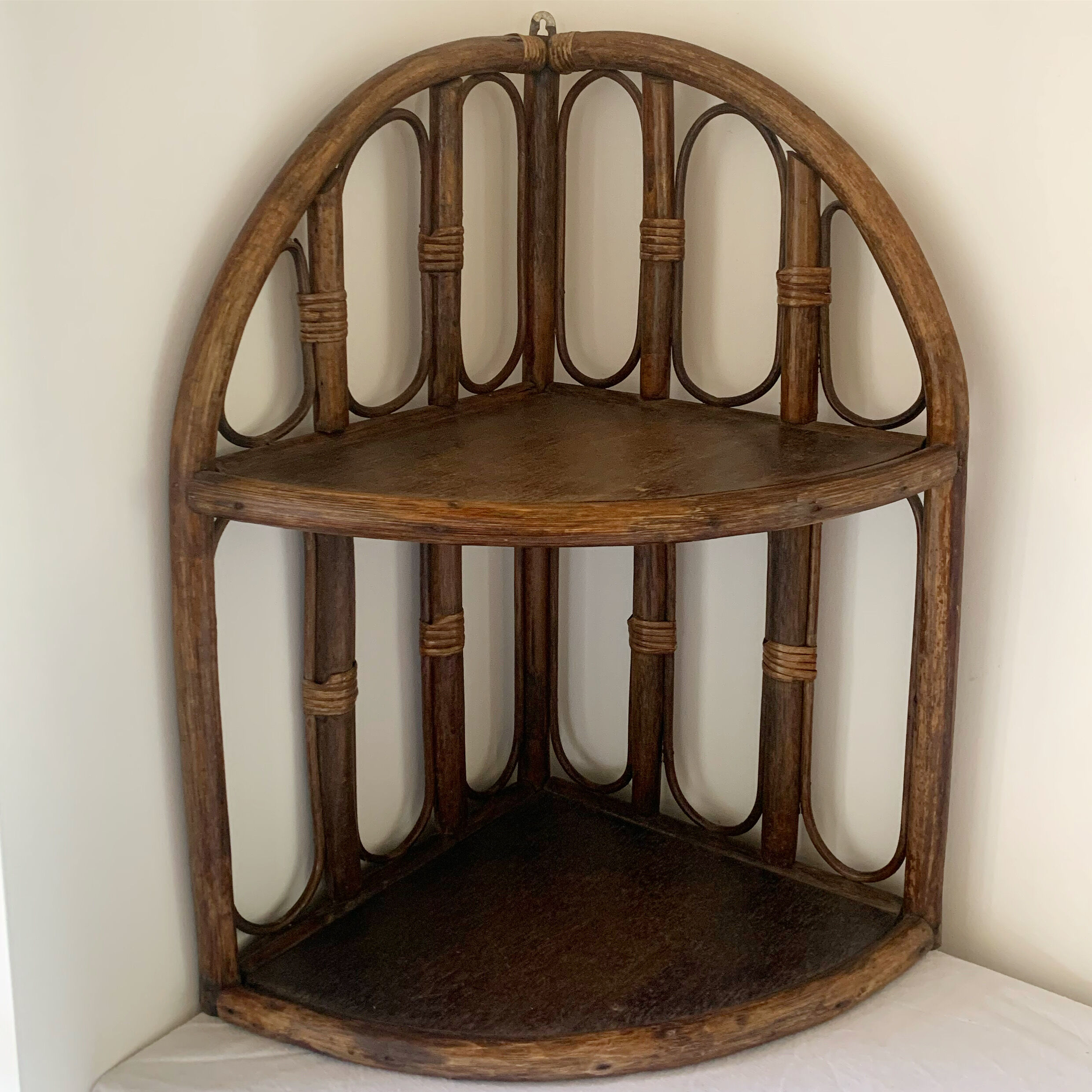 Rattan corner shelf
