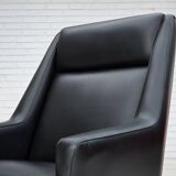 1970s, Danish highback armchair, black artificial leather, teak wood legs.