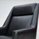 1970s, Danish highback armchair, black artificial leather, teak wood legs.